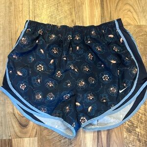 Nike Women's Floral Athletic Shorts - Navy Blue